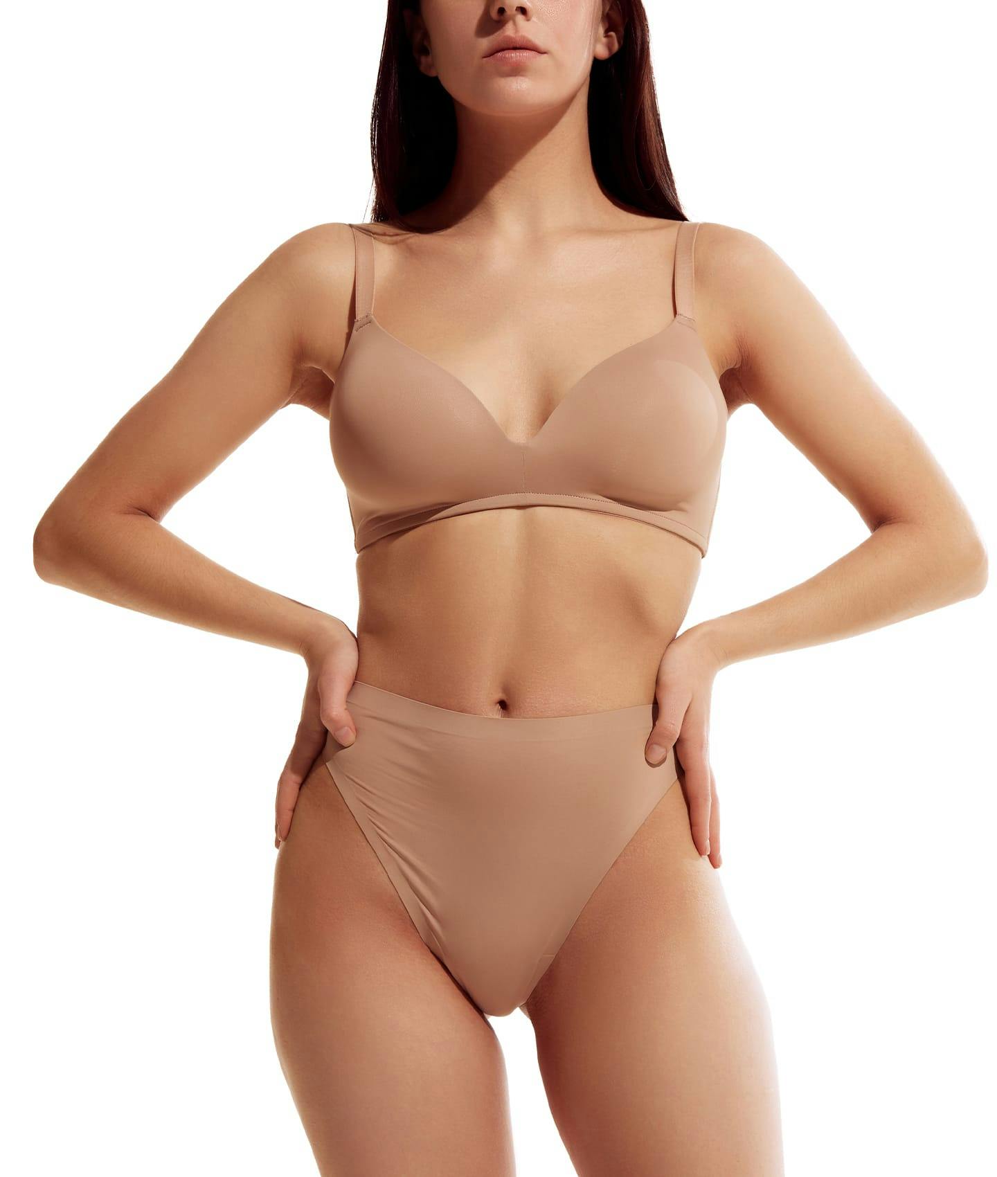 woman posing in tan undergarments