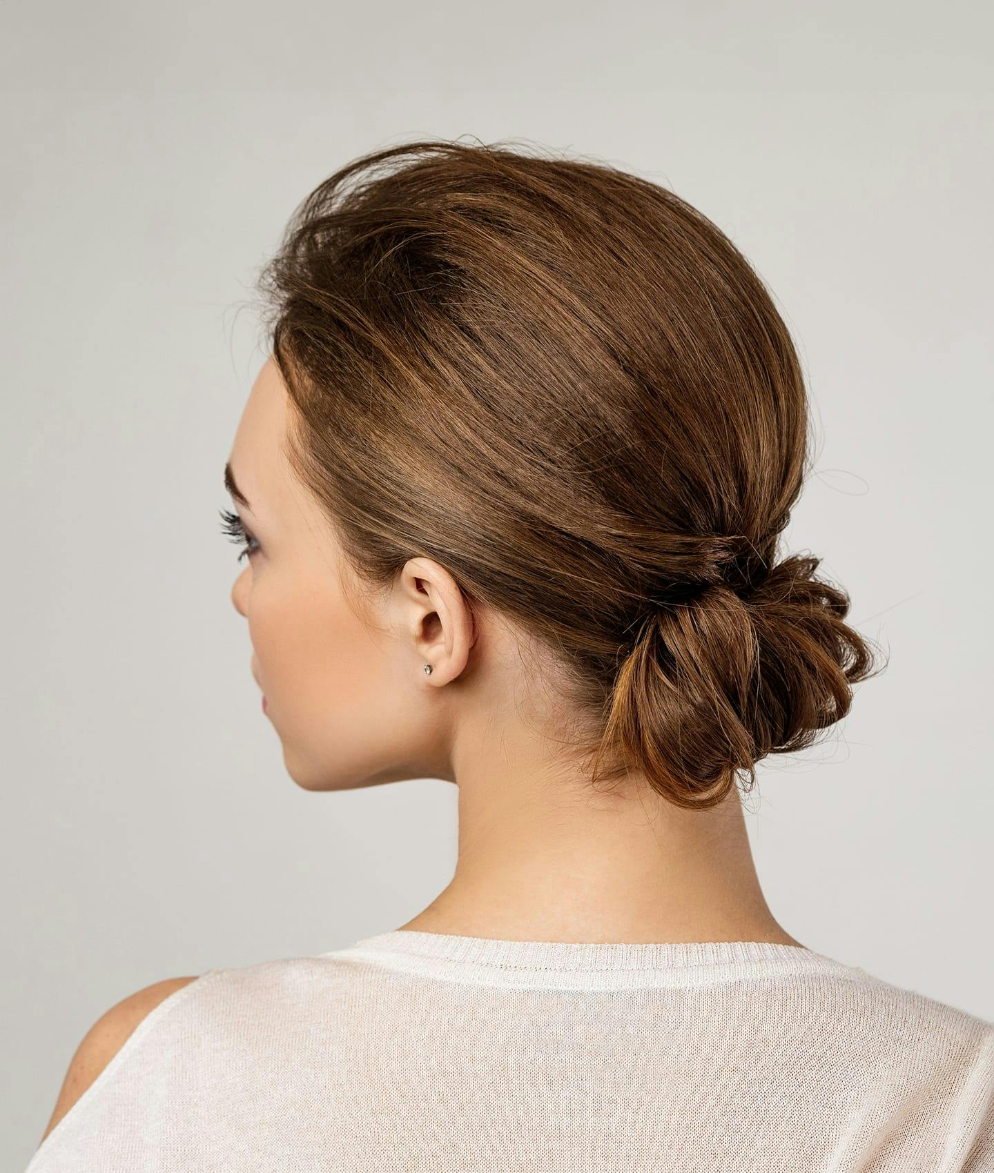 woman's hair pulled into bun