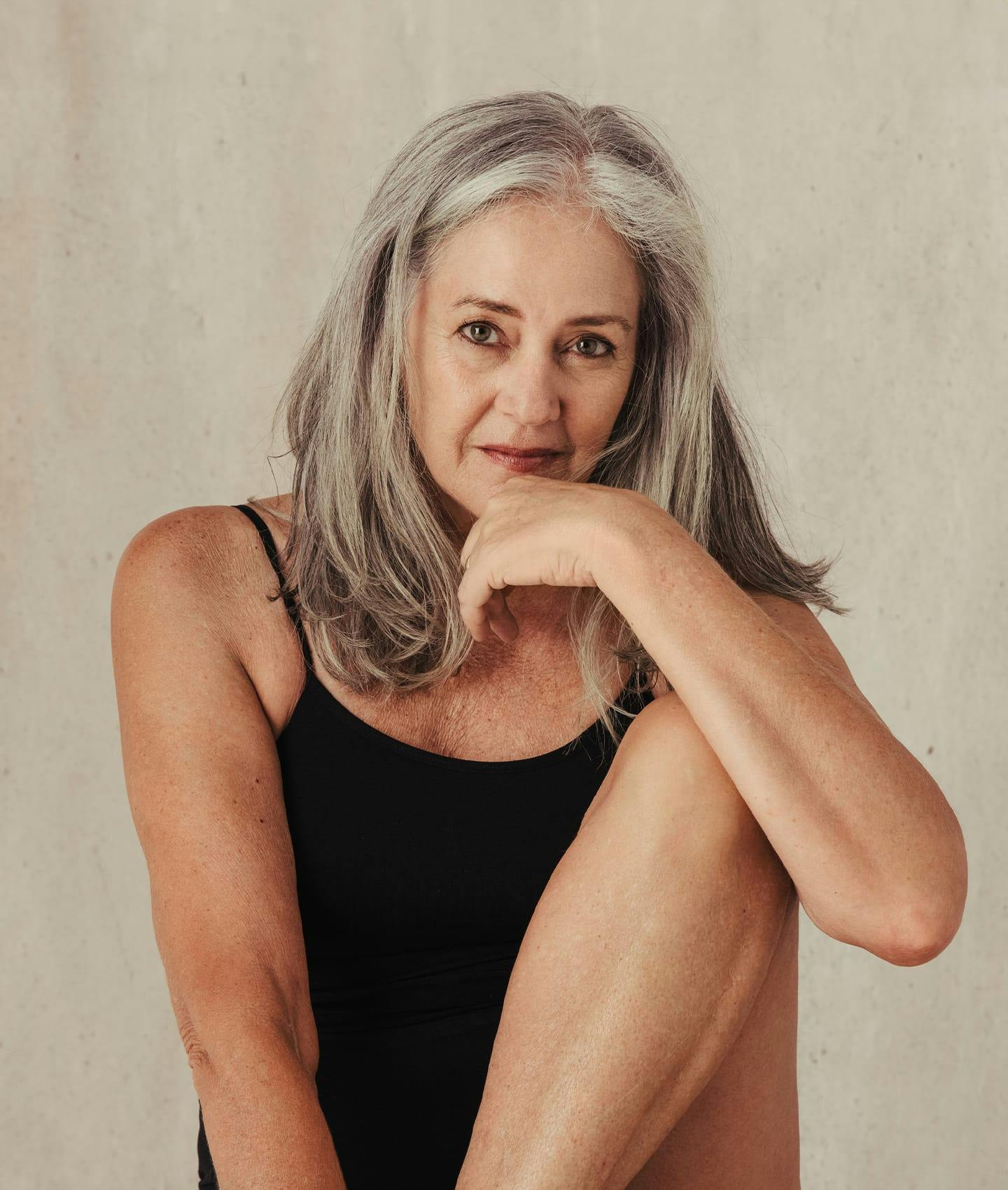 woman posing in black top