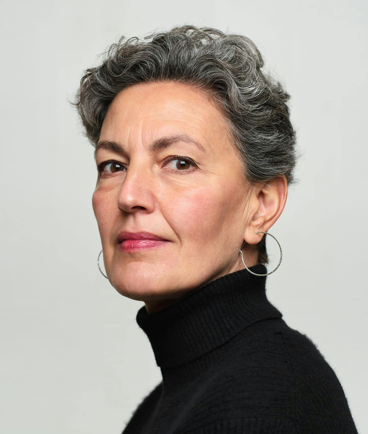 woman in black turtleneck