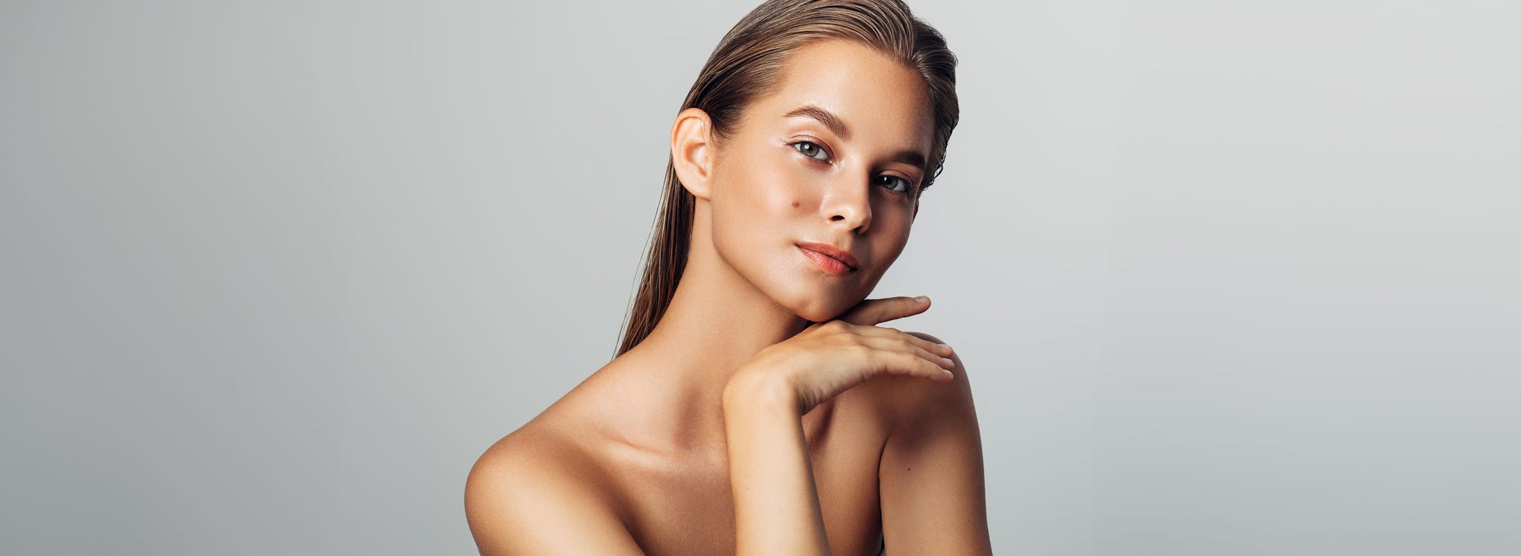 Woman with her hair slicked back