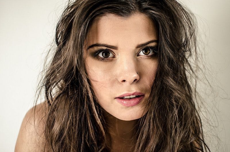 A woman with messy hair