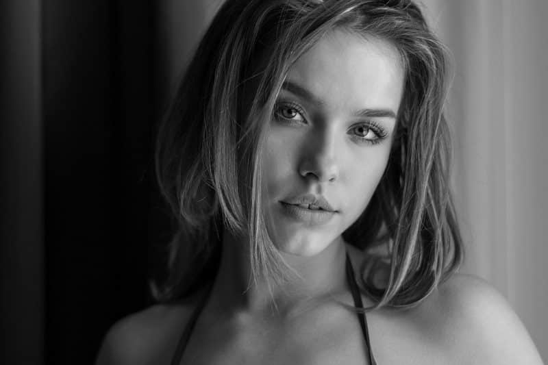 Dr. Allan Wulc Upper and Lower Blepharoplasty Review Black and White Photo of a Woman Staring Directly at the Camera