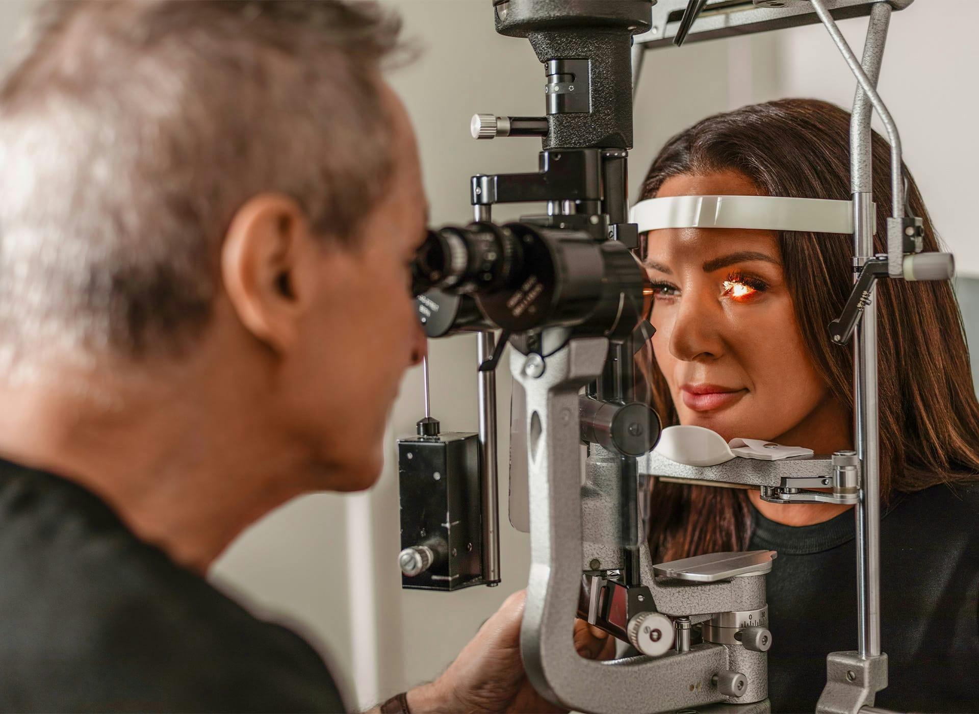 Dr and patient during eye treatment