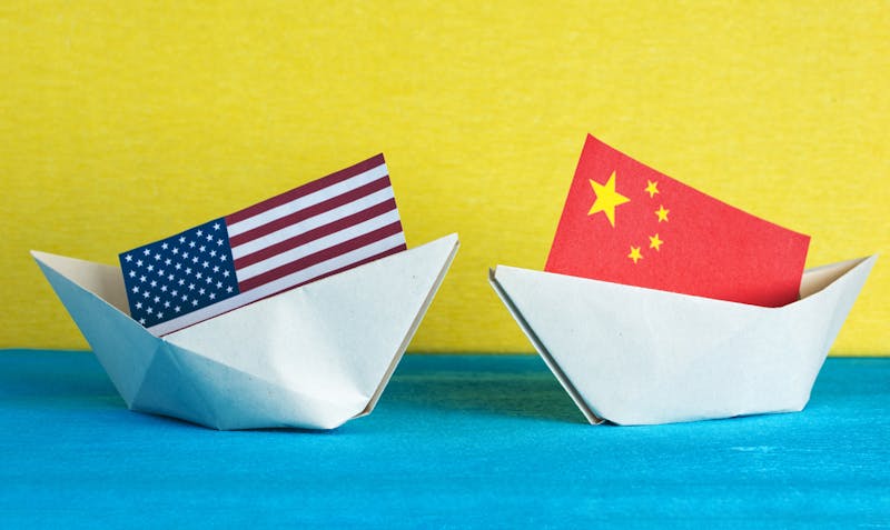 Amerikaans en Chinees bootjes in handelsoorlog met elkaar