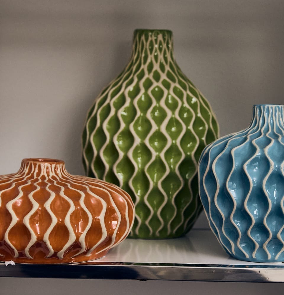 3 vases with funky pattern in different colors