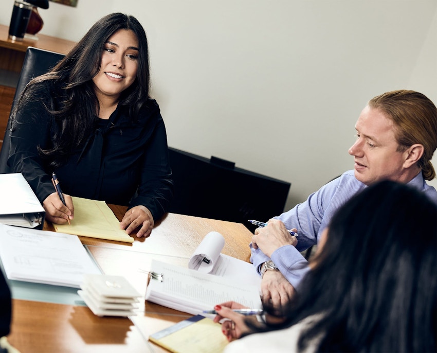 Attorneys sitting at table together