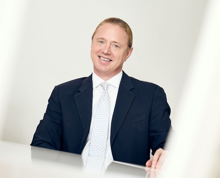 Hella and client looking at forms