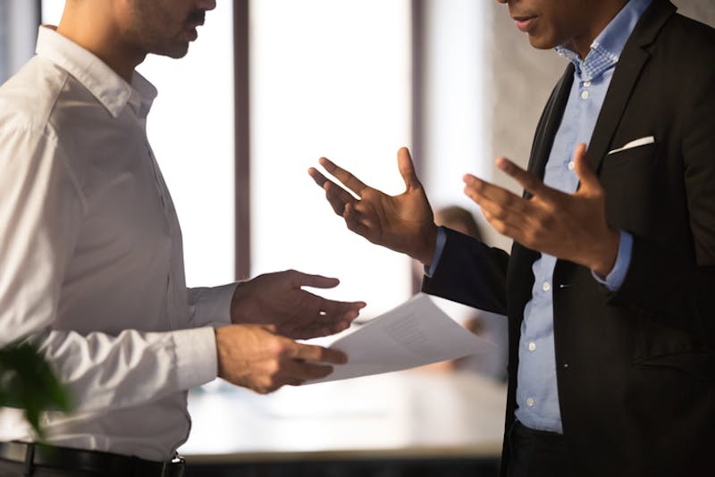 Business men arguing