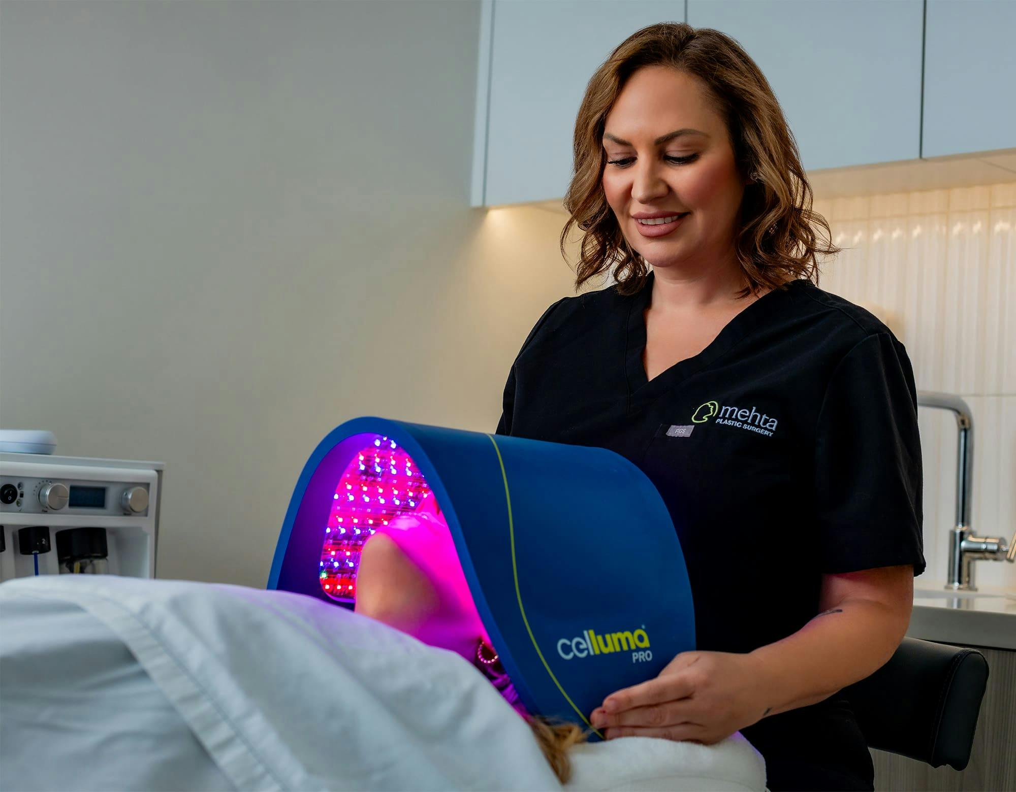 Nurse and patient during light treatment