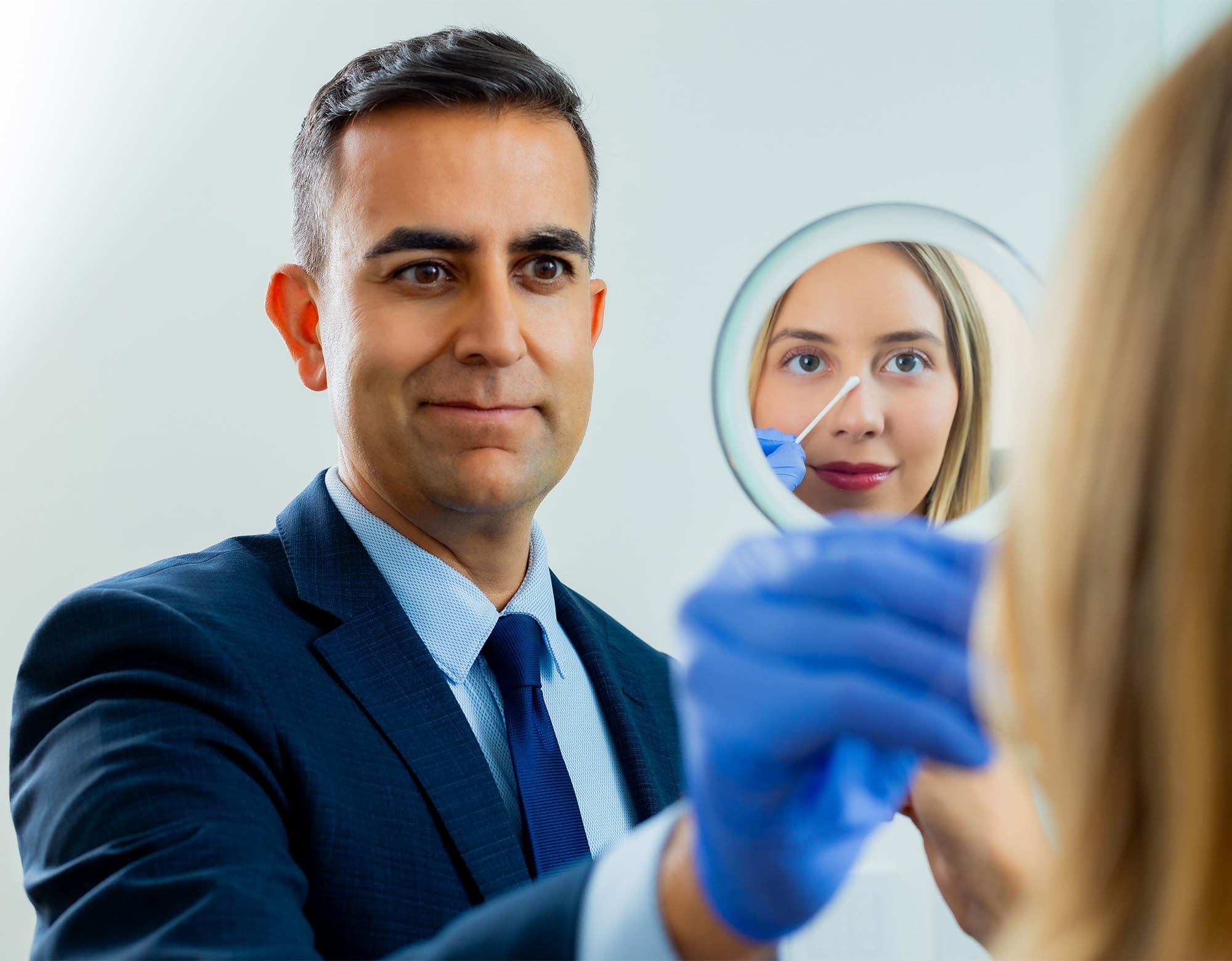 Dr. Mehta with patient during consultation