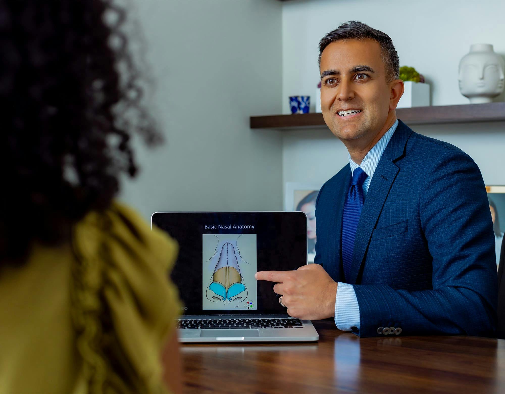 doctor pointing to screen
