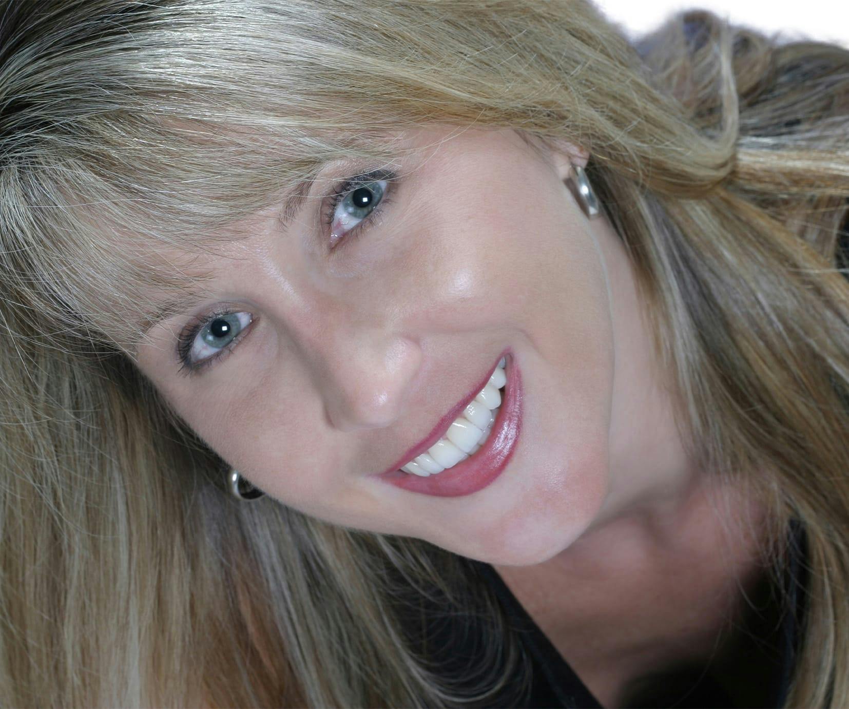 woman with blonde hair with bangs