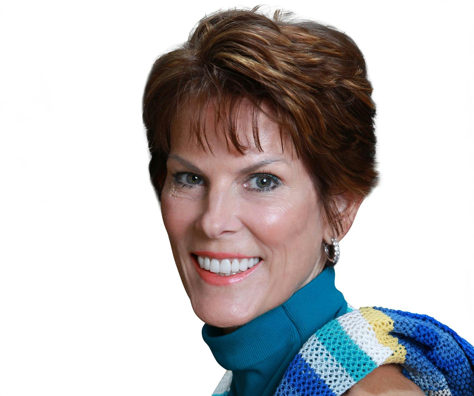 woman with short brown hair smiling