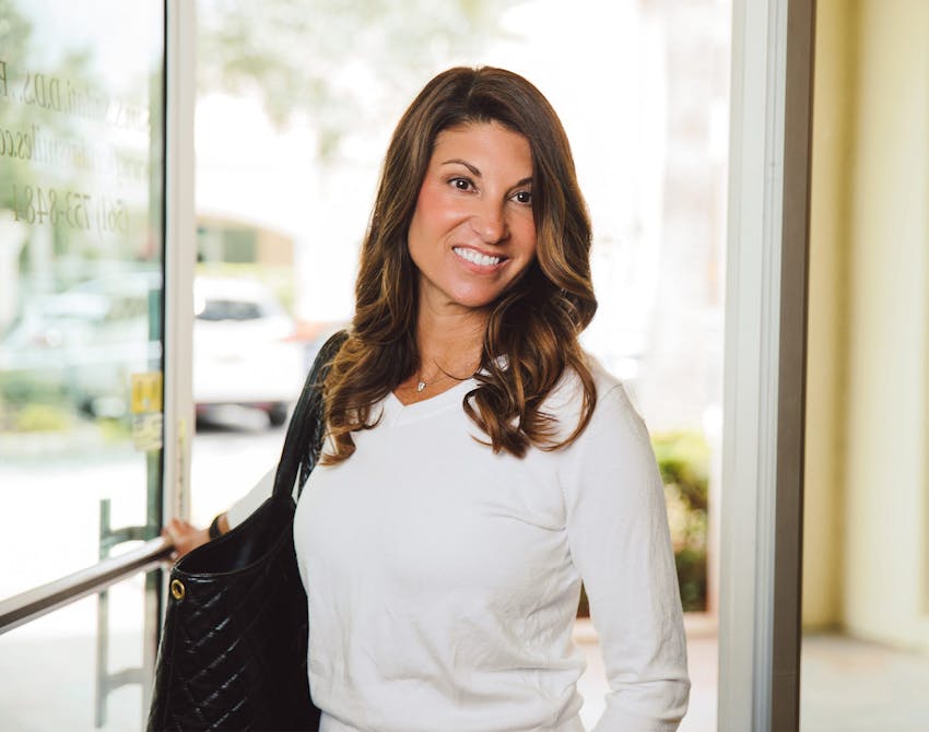 woman in a long sleeve white shirt