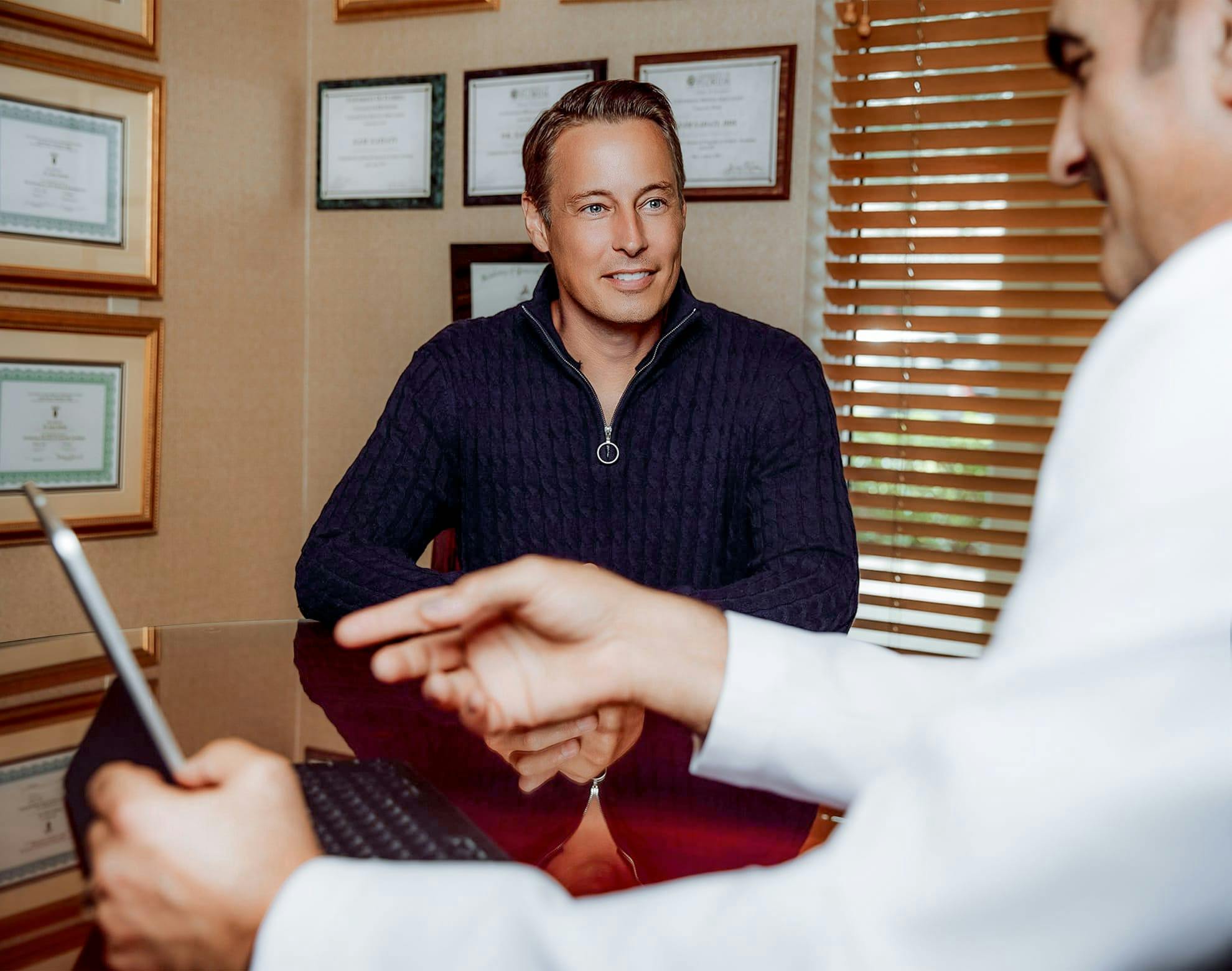 male patient meeting with Dr. Sadati