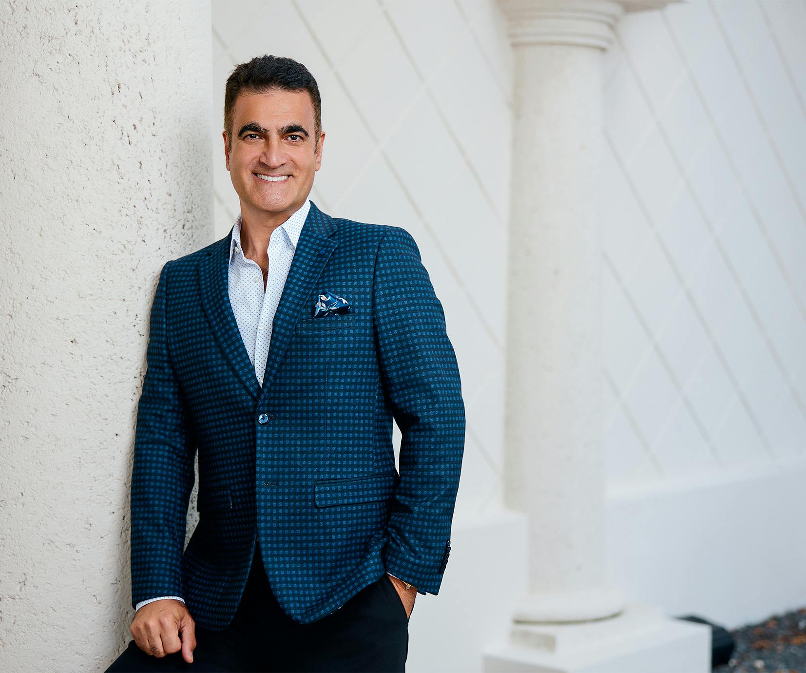 Dr. Sam Sadati in suit