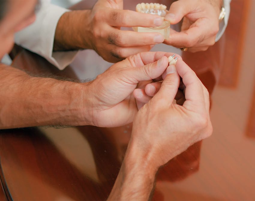 woman in a pink blouse