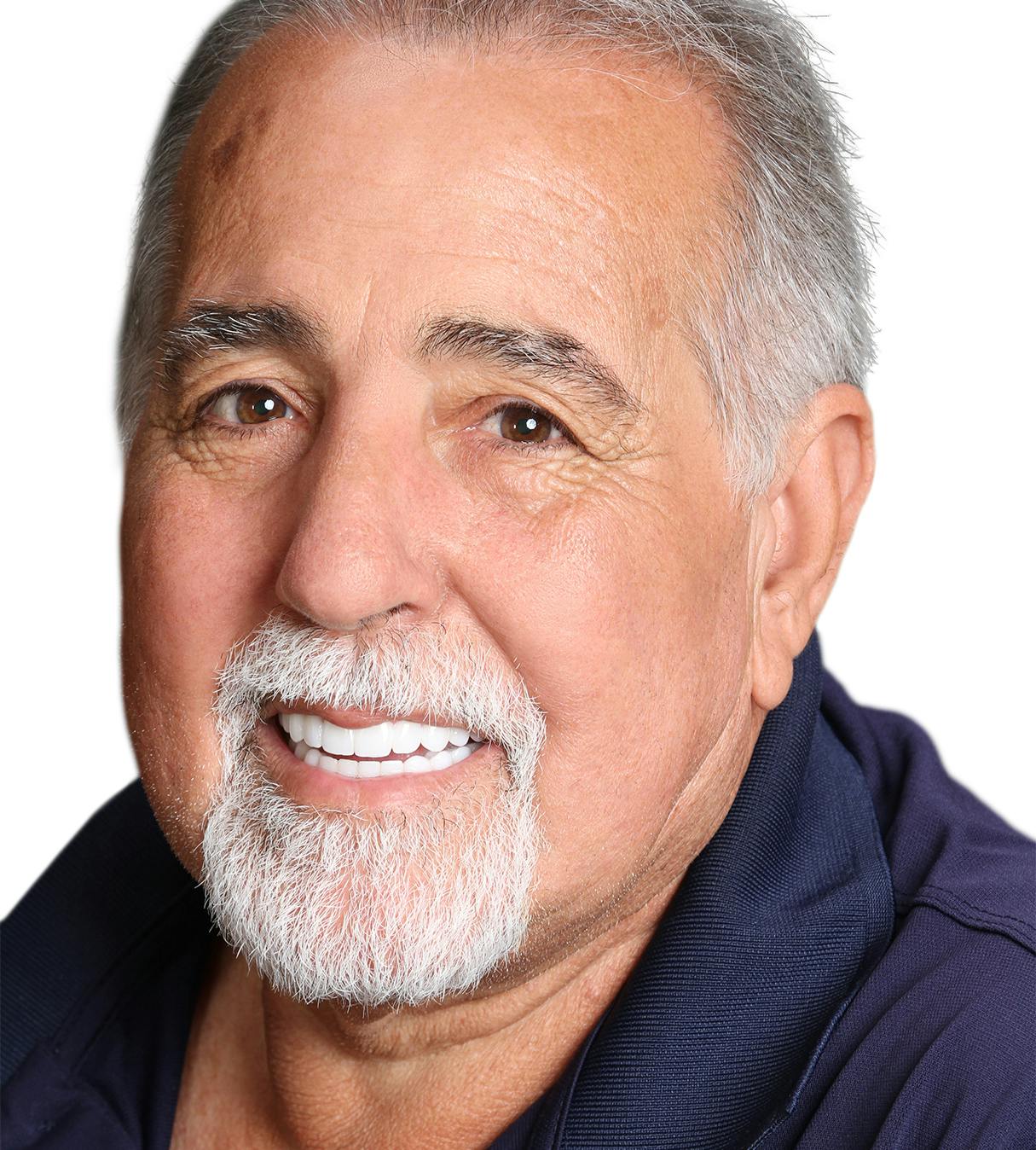 Satisfied male patient with dental implants