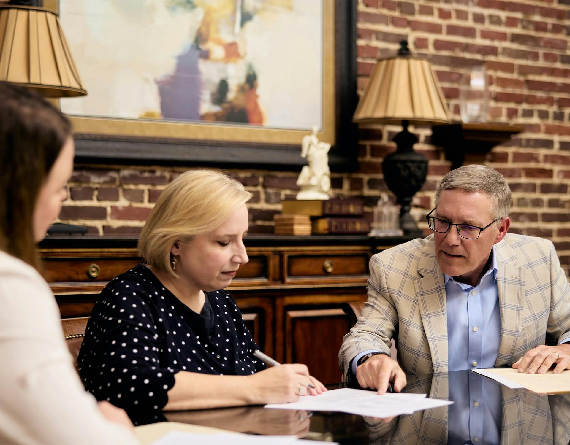 Lawyers and client meeting
