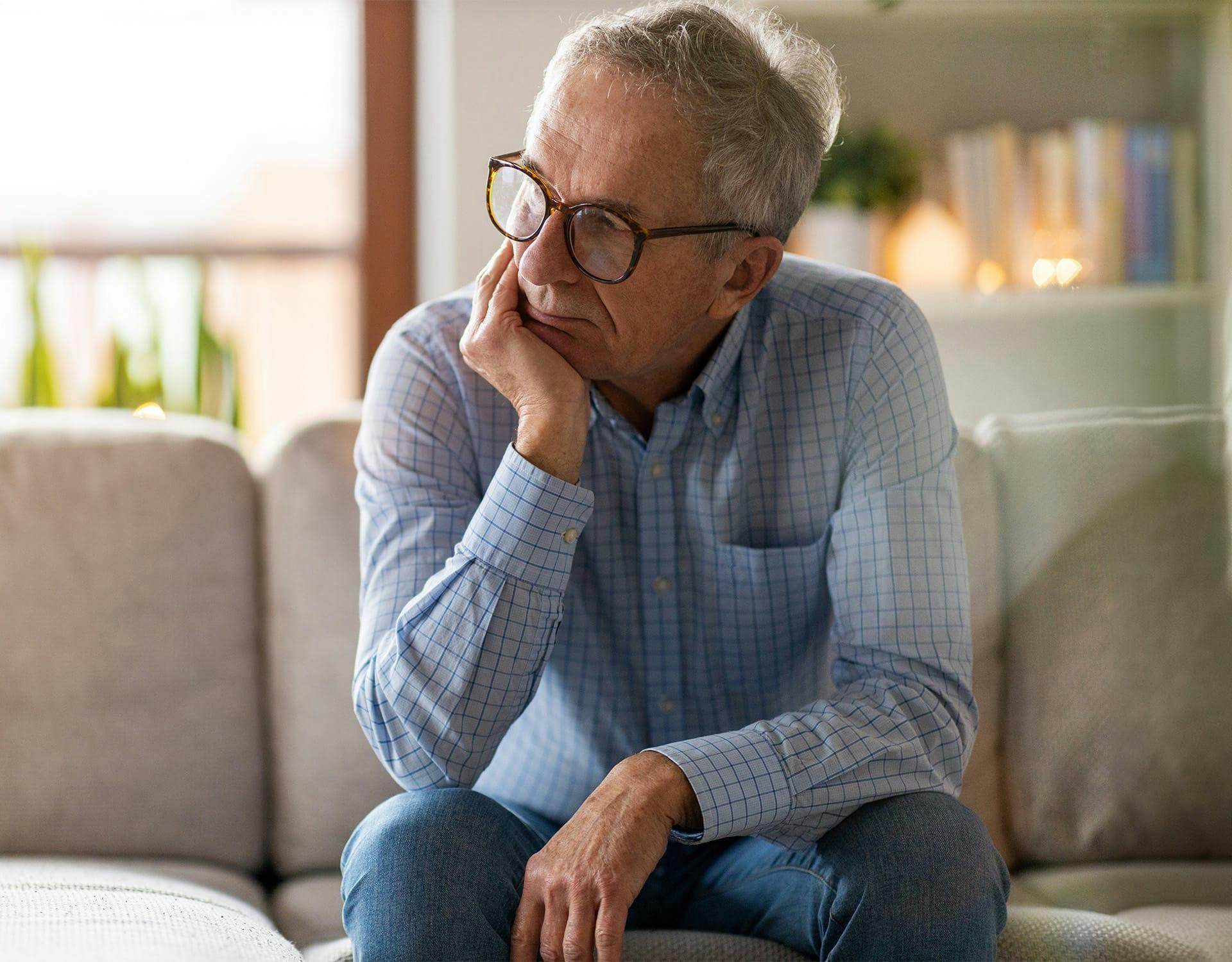man sitting on a couch