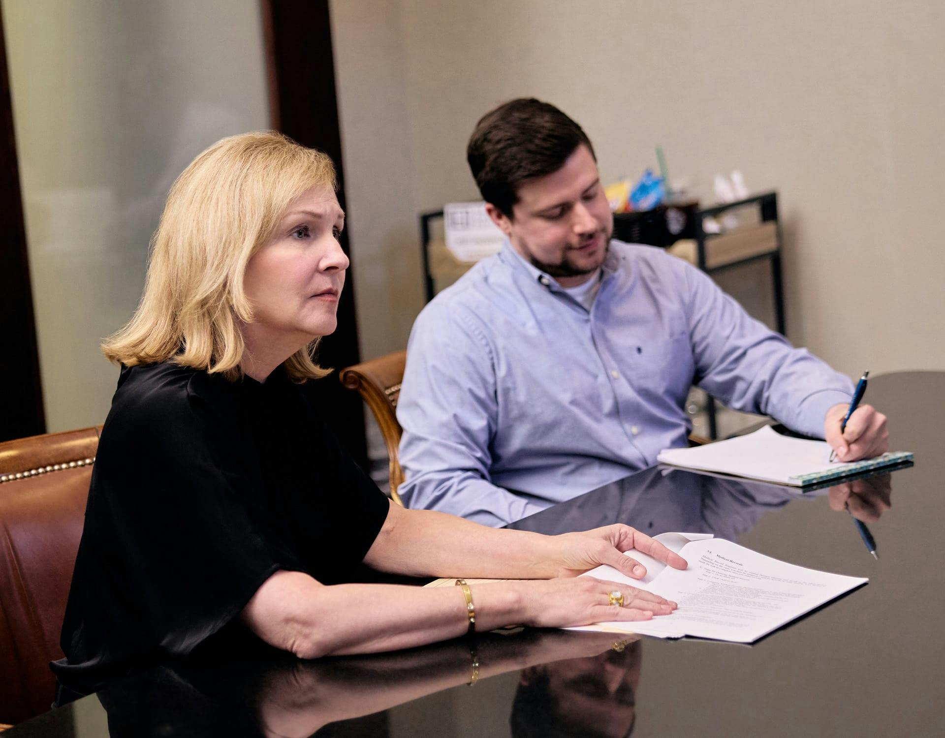 Lawyer and client at a table