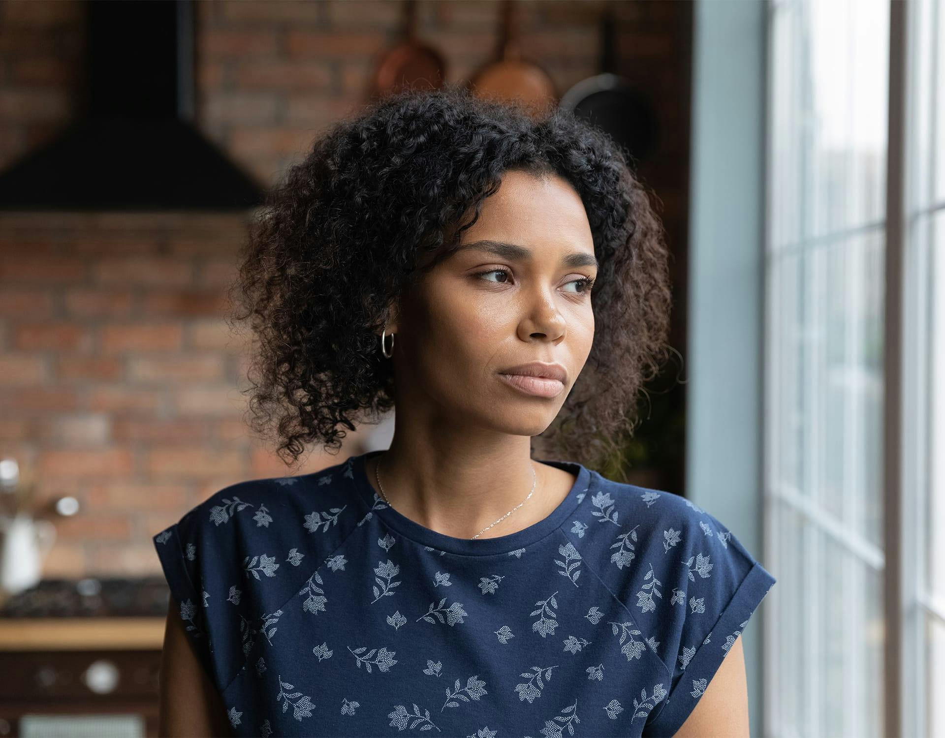 man with his hands on his face