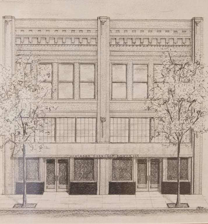 statue of a woman holding a scale