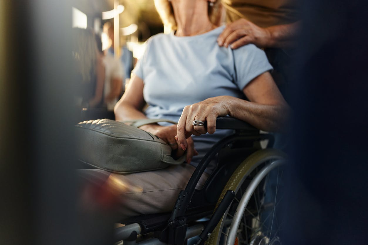 An older woman in a wheelchair