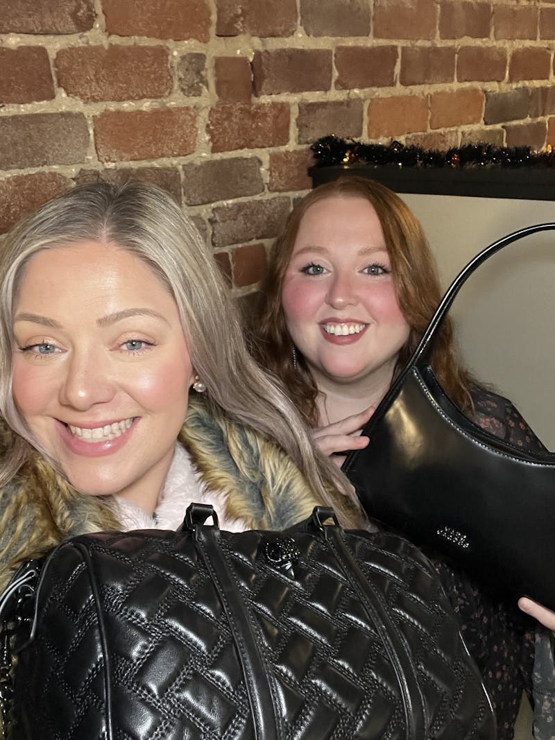 Taylor and Catherine with purses