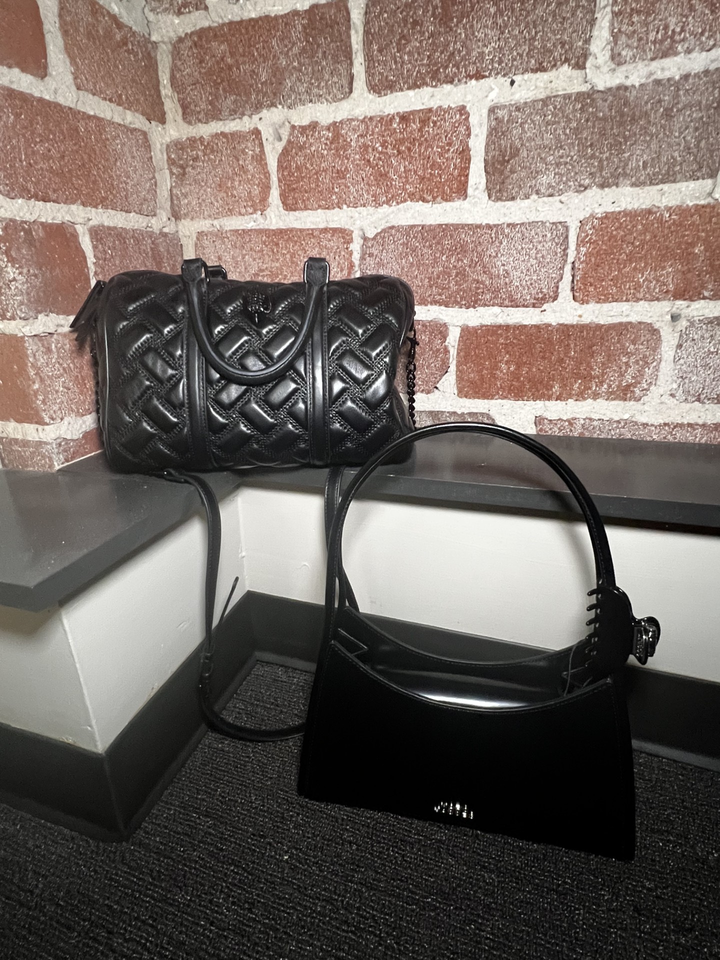 two black purses