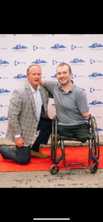 Erik with speaker at a Crisp event