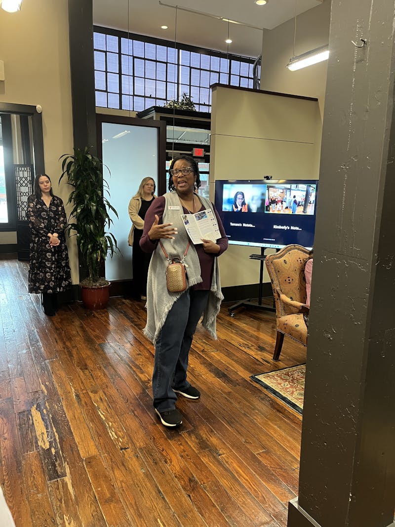 Terri Harvill at firm huddle