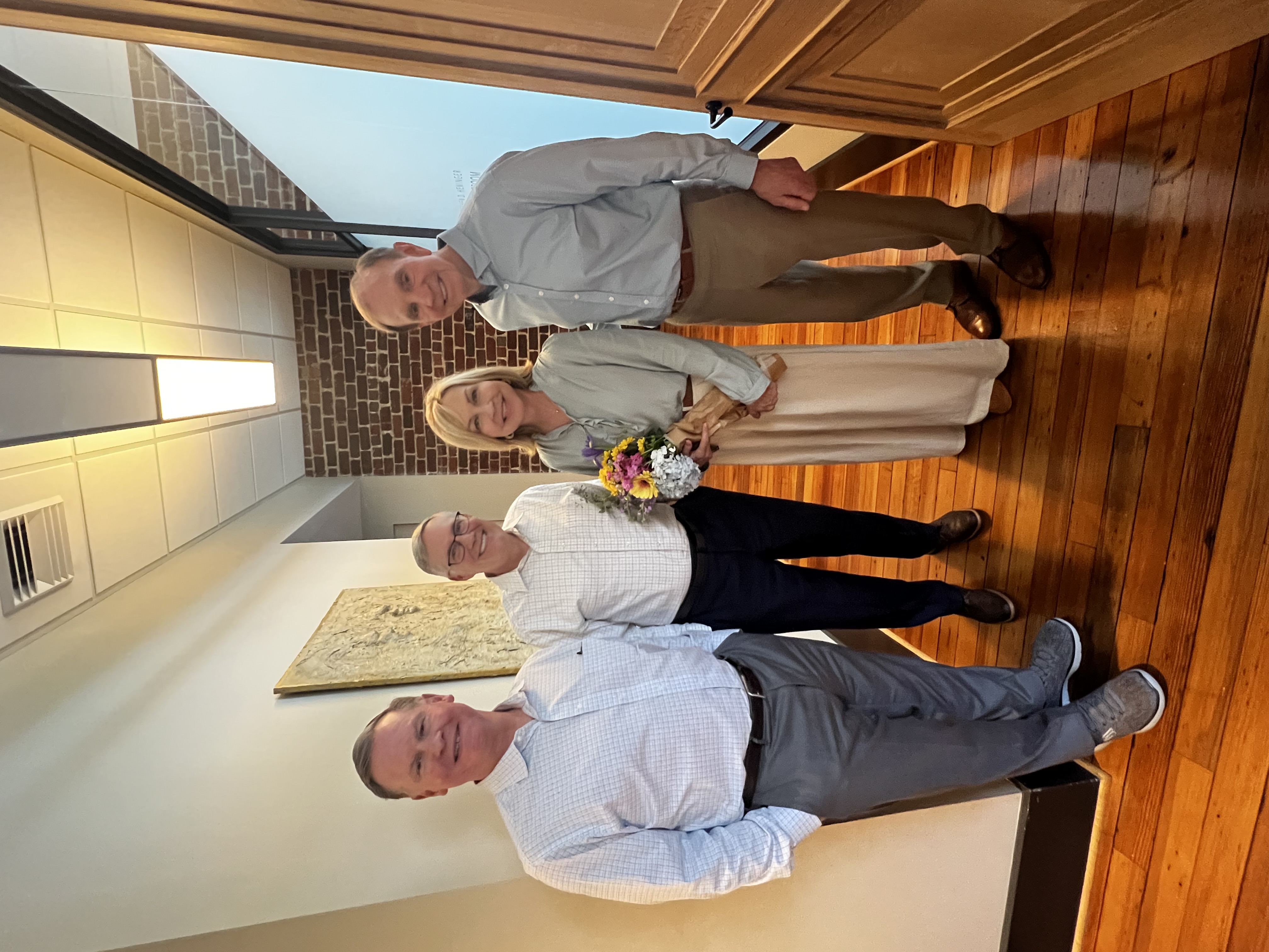 Lee Gresham, Bill Bross, and Tim Davis with employee