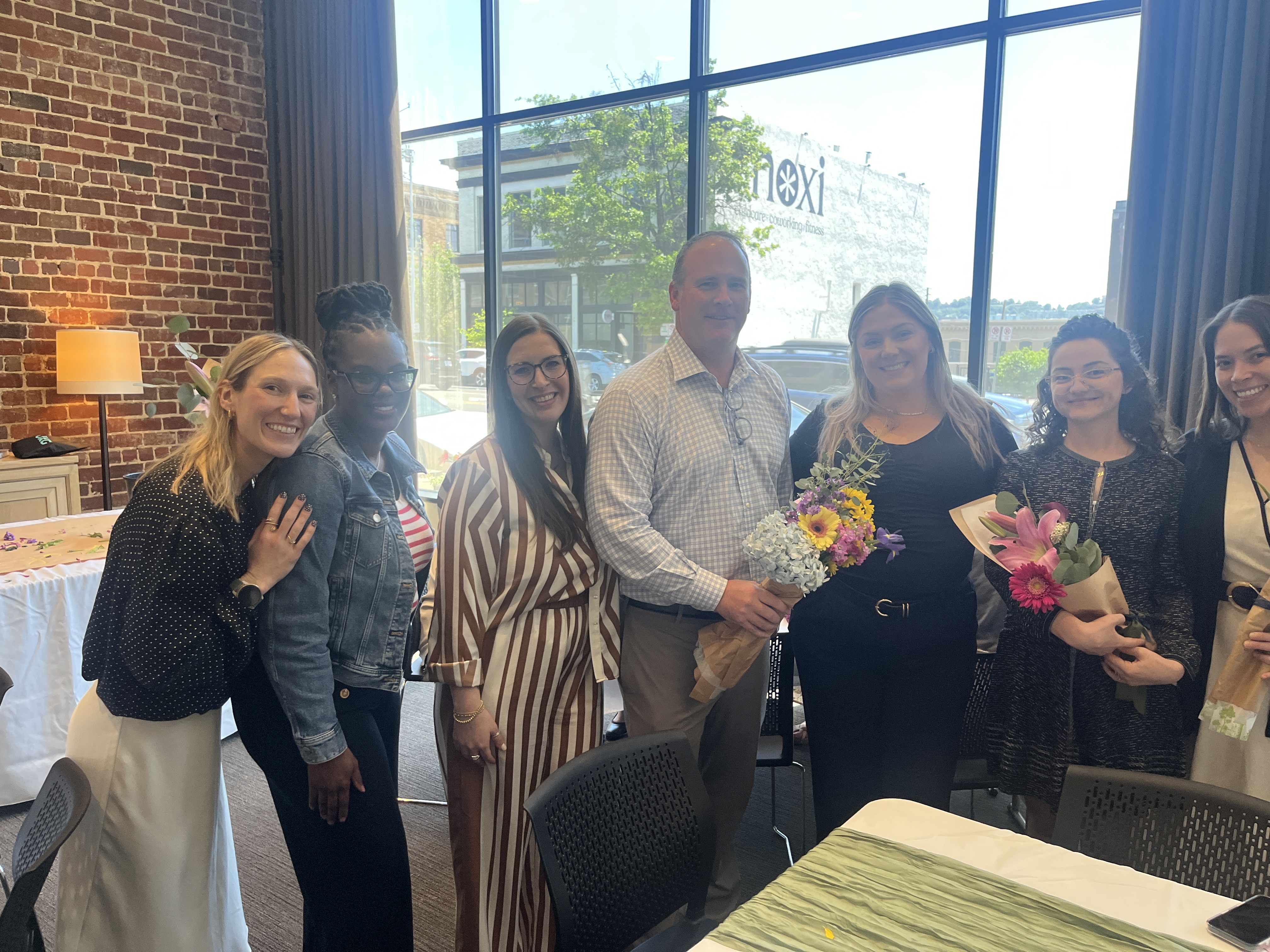 HGD staff posing with Erik Heninger
