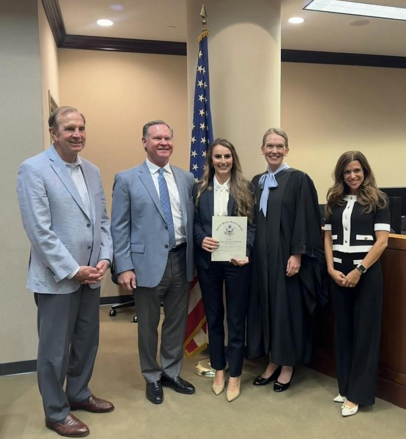 Anabel Braziel with HGD colleagues Tim Davis, Caroline Hollingsworth, and Lee Gresham after her swearing-in to the U.S. District Court for the Northern District of Alabama