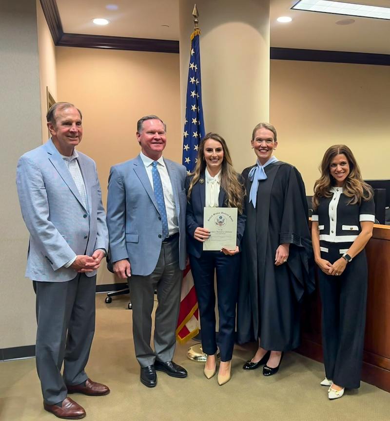 Anabel Braziel with HGD colleagues Tim Davis, Caroline Hollingsworth, and Lee Gresham after her swearing-in to the U.S. District Court for the Northern District of Alabama
