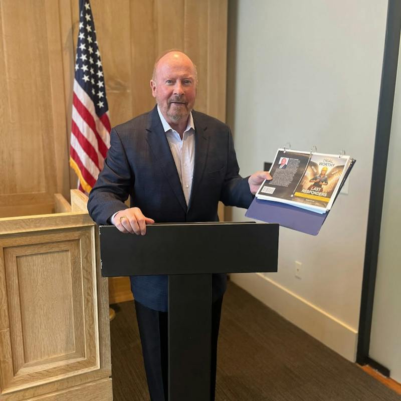 Steve Heninger with book