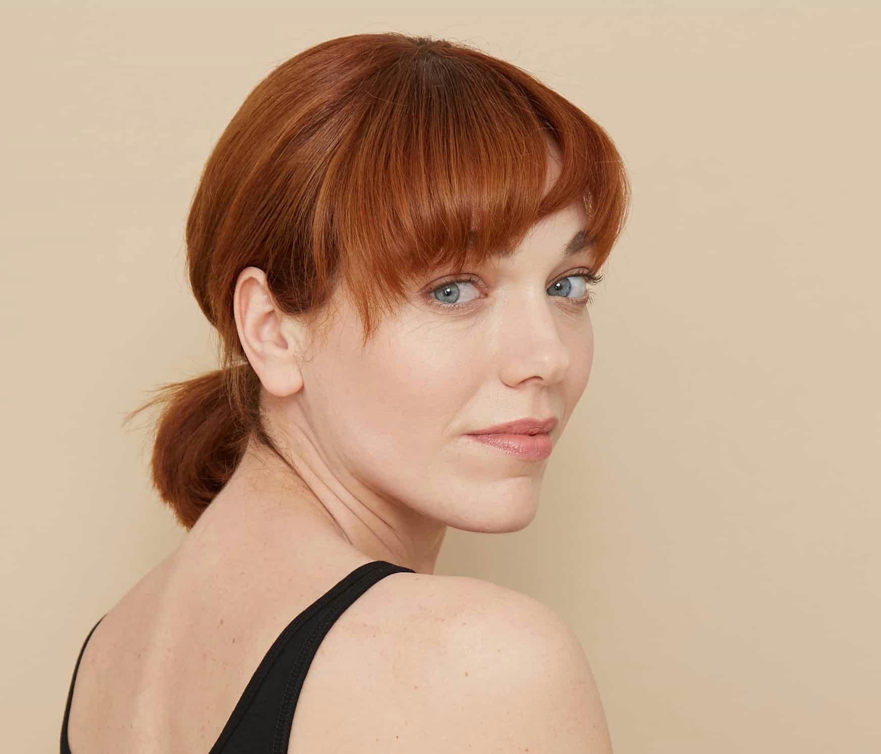 Woman looking over shoulder