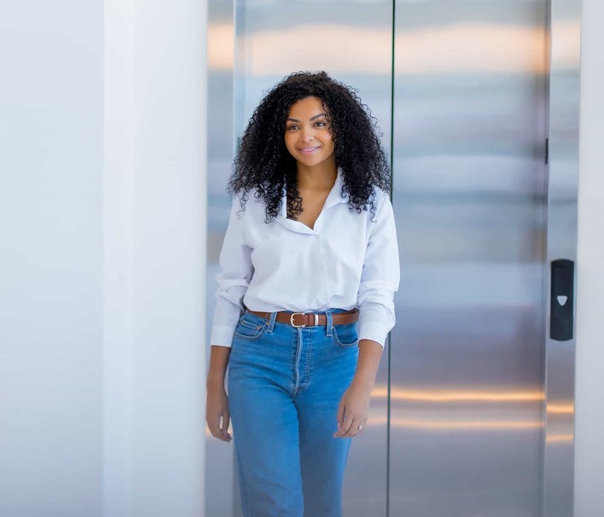 Woman walking from elevator