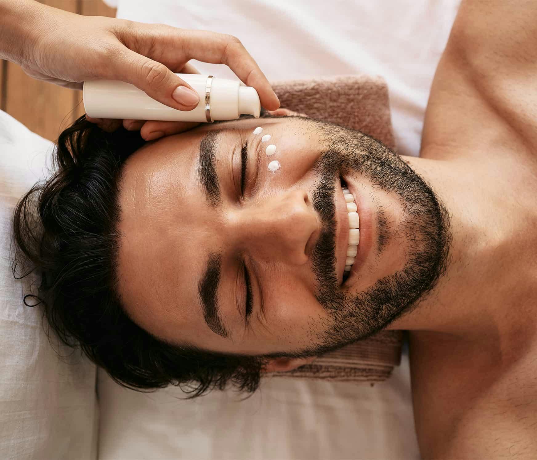 Man smiling during treatment