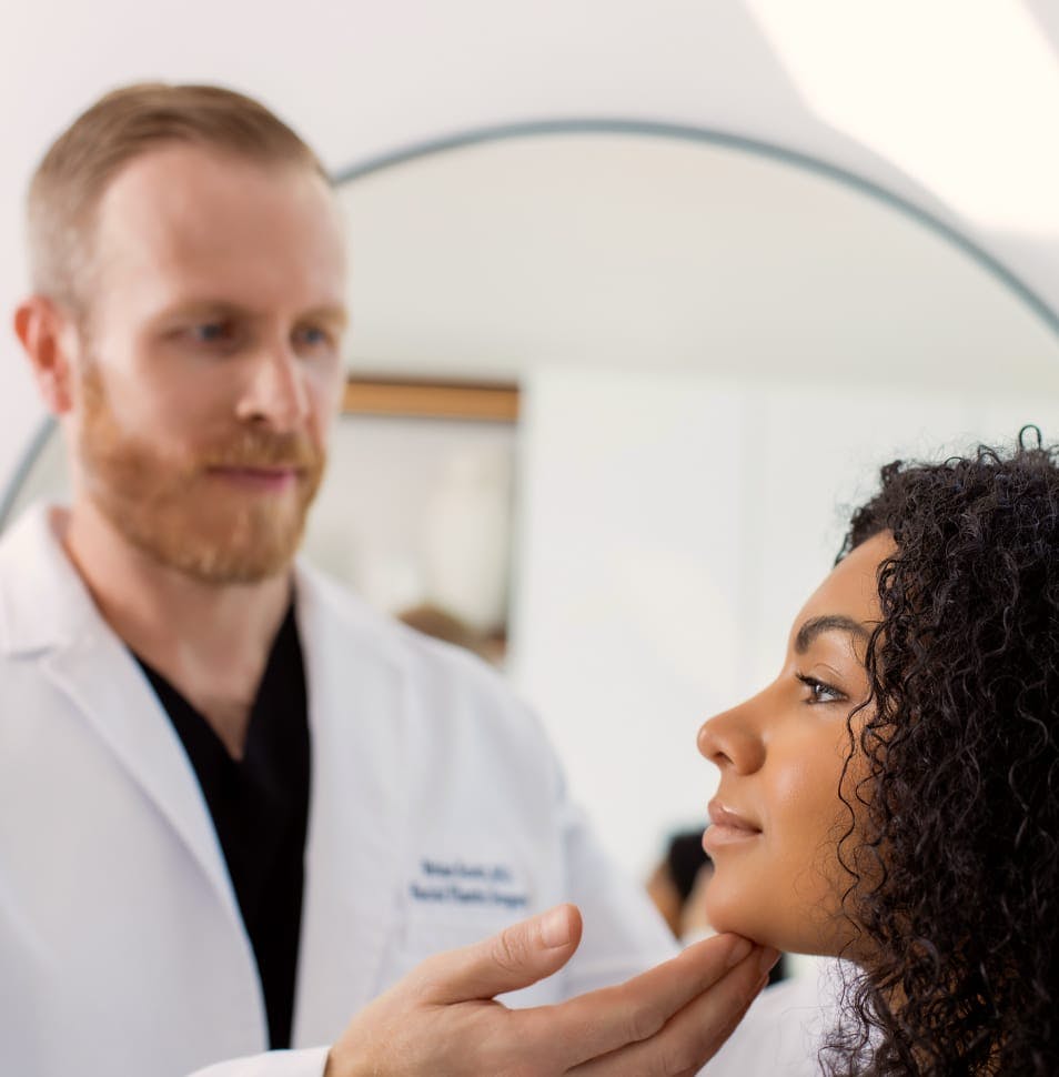 Dr. Brian Scott with a female patient
