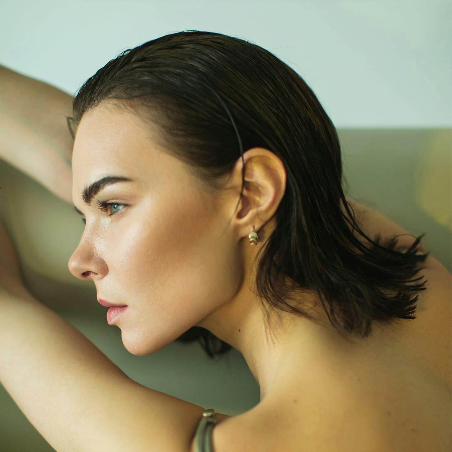 Woman looking over shoulder