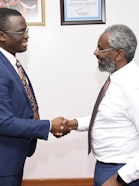 Two men shaking hands.