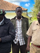 Opinion leaders from Oldonyiro town, Isiolo County, listen keenly to a briefing before traveling to Konza City where they learned how planning can be done to consider both development and wildlife corridors.