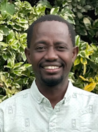 Portrait of Alex Kimiri