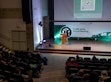 Person holding a speech in a Forum