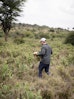 Lorenz Zeller identifying opuntia distribution in the landscape, Laikipia, Kenya
