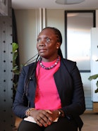 Woman sitting and looking to the side