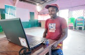 At the Ivo-toerana Mirohy community center, Delien explores examples and instructions to improve his handmade plow.
